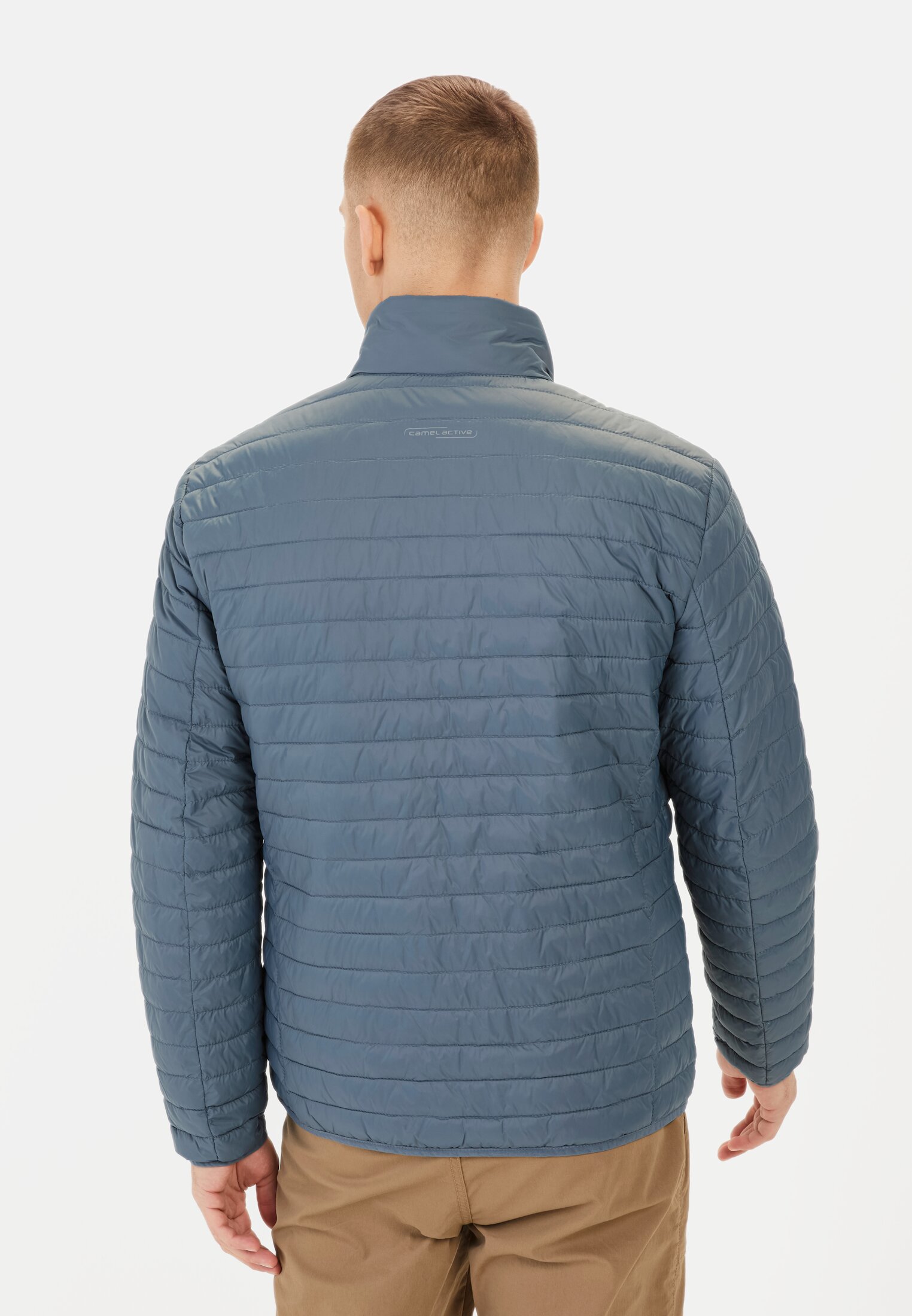 Herren Steppblouson mit Stehkragen Blau getragen hinten