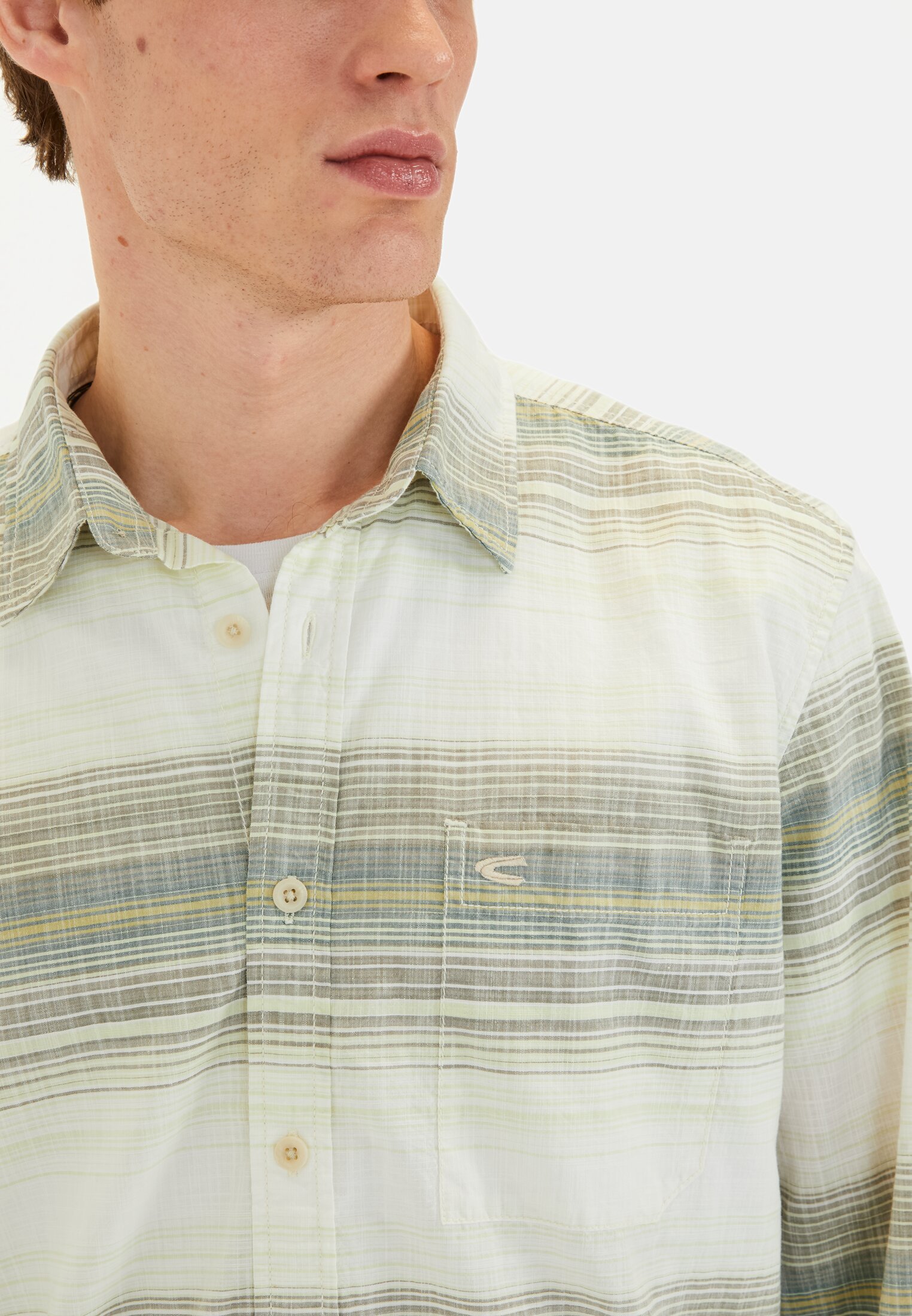 Men Striped shirt made of pure cotton Green worn detail close