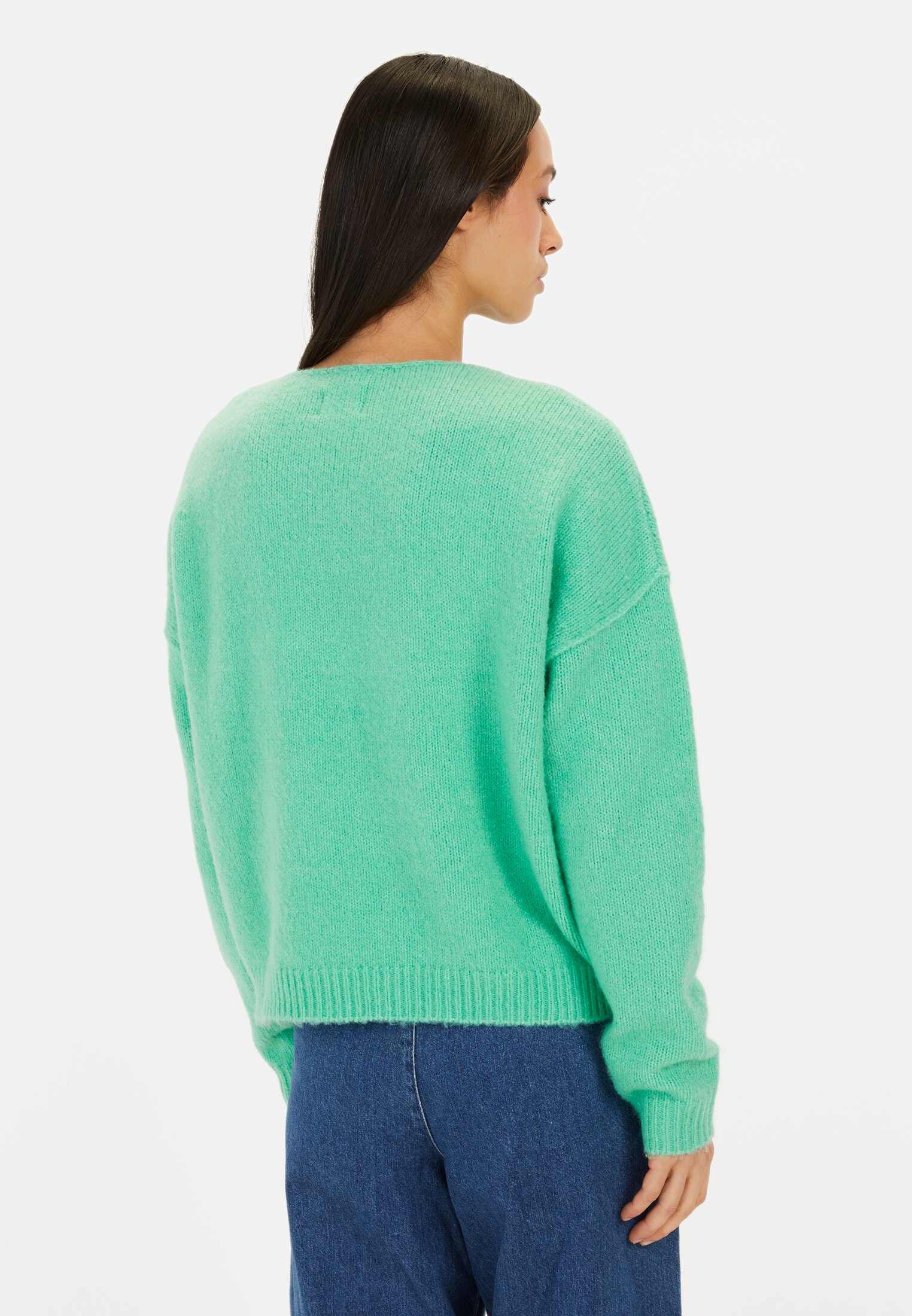 Women Knitted sweater made from a wool blend Peppermint worn back