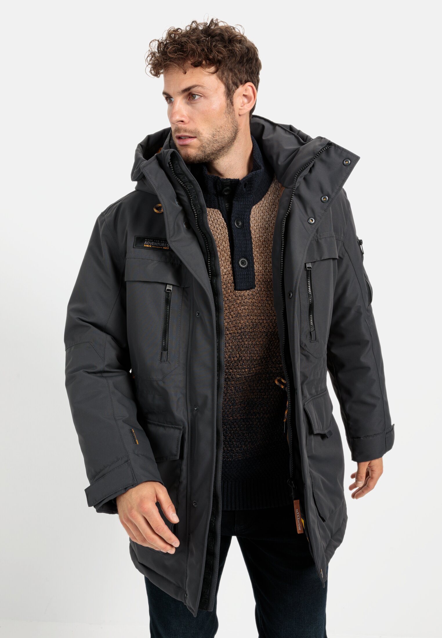 Heren teXXXactive®  Functionele parka met reflecterende details Graphite Gray gedragen voor